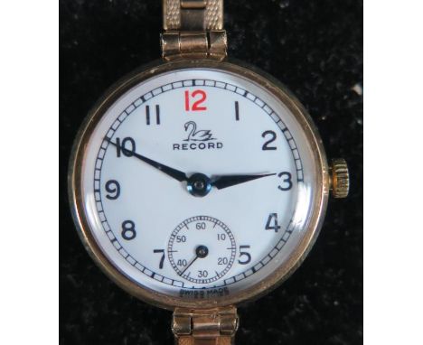 A Record 9ct Gold Ladies Manual Wristwatch on a rolled gold strap, running &amp; boxed 