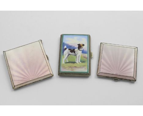 AN ART DECO RECTANGULAR CIGARETTE CASE AND MATCHING POWDER COMPACT decorated in pearlescent pink enamel, by two different mak