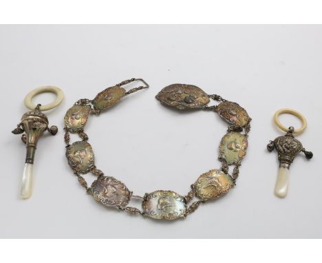 AN EDWARDIAN BELT consisting of linked panels, each decorated in relief with a cherub mask, by William Comyns, London 1903 to