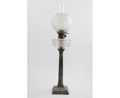 A LATE VICTORIAN ELECTROPLATED-MOUNTED COLUMN LAMP with a cut glass reservoir, glass shade and chimney, c.1900; 32.75" (83cm)