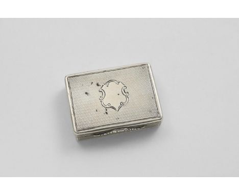 A VICTORIAN RECTANGULAR VINAIGRETTE with engine-turned decoration, a vacant shield cartouche on the cover and a serpentine th