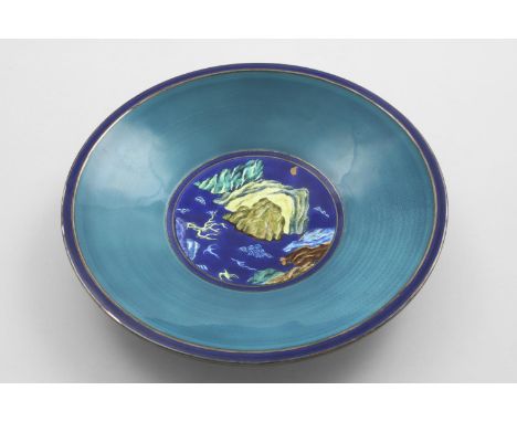 A MID 20TH CENTURY NORWEGIAN DISH of shallow circular outline, on a collet foot, the interior enamelled in the centre with a 