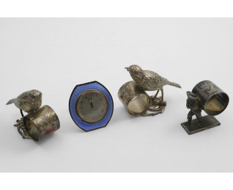 THREE LATE 19TH CENTURY PLATED BRITANNIA-METAL NAPKIN RINGS (two birds and a figure), one inscribed "Bonnie", all by the Meri