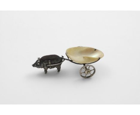 AN EDWARDIAN NOVELTY PIN CUSHION in the form of a pig harnessed to a mother of pearl shell cart, maker's mark overstriking an
