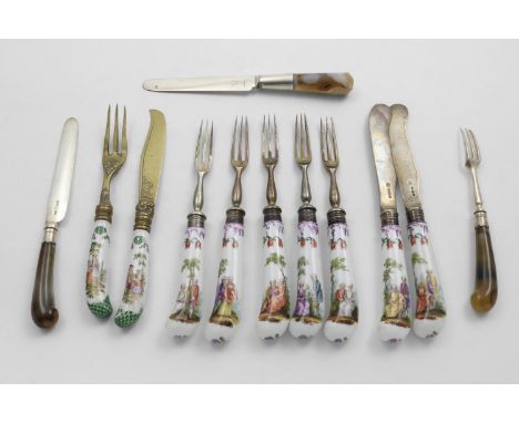 A SET OF FIVE LATE VICTORIAN DESSERT FORKS AND TWO DESSERT KNIVES with painted porcelain, pistol handles, by H.Wilkinson &amp