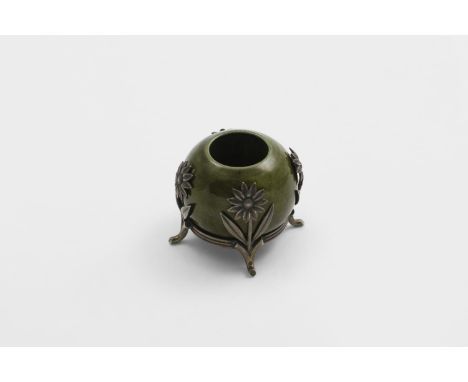 BY KARL FABERGÉ: a late 19th century Russian green-glazed pottery stand or holder* of globular form, with a reeded circular b