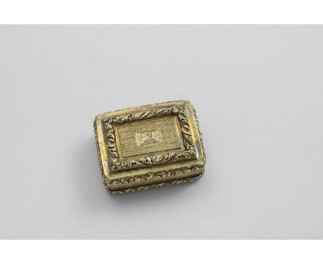 A GEORGE IV SILVERGILT RECTANGULAR VINAIGRETTE with reeded sides, raised floral borders and an engine-turned base and cover, 