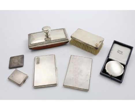 A MIXED LOT:- a mounted wooden desk blotter with Greek-key borders, two rectangular engine-turned cigarette cases, each initi