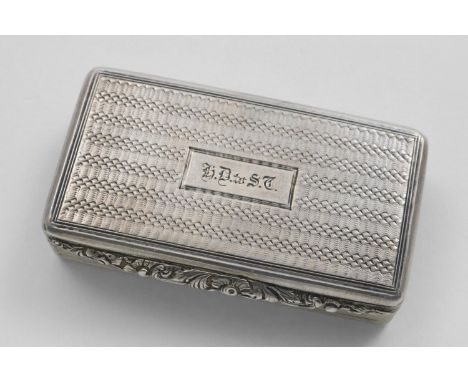 A WILLIAM IV ENGINE-TURNED SNUFF BOX rectangular with reeded sides and a chased floral thumbpiece, initialled "HD to ST" on t