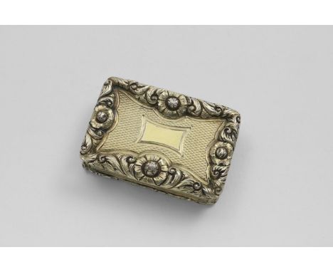 A GEORGE IV SILVERGILT RECTANGULAR VINAIGRETTE  with raised and chased floral borders, with engine-turned base, sides and cov