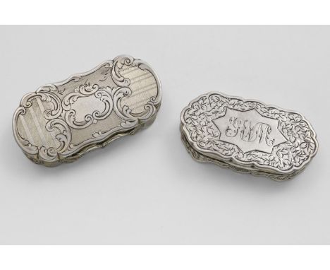 A VICTORIAN VINAIGRETTE of shaped rectangular outline, with rounded ends, decorated with reserves of various engine-turned pa