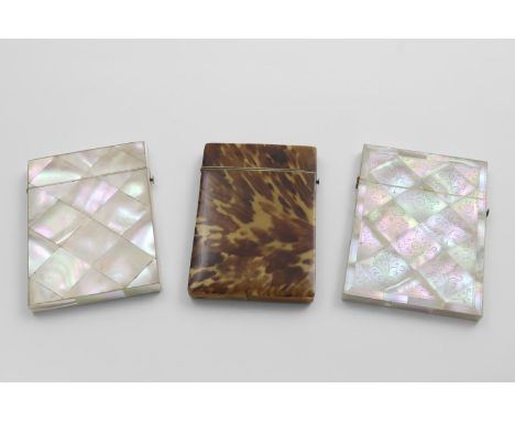 AN EARLY VICTORIAN TORTOISESHELL CARD CASE and two other similar mother of pearl card cases (one engraved with flowers), each