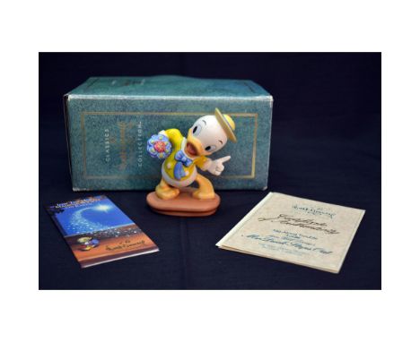 Bisque Porcelain Decorated, this sculpture was created through the collaborative efforts of the animators and other artists o