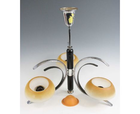 A 1960s Danish chromed metal and ebonised three-branch ceiling light, of 'C' scroll form, with peach and frosted removable sq