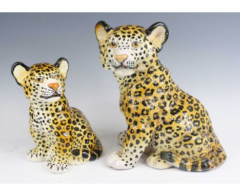 A 1970s Italian ceramic model of a leopard cub, in seated pose, underglazed pained, titled Italy to underside of one paw, h.3