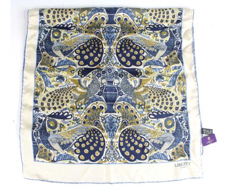 Liberty of London - a silk scarf, all-over profusely peacock and floral decorated, titled 'Liberty London' to one corner, wit