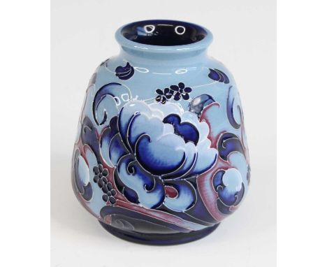 A contemporary Moorcroft James Macintyre &amp; Co miniature squat vase, underglaze floral tube-line decorated in tones of blu