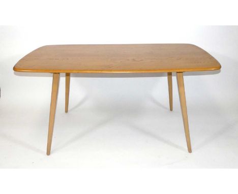 An Ercol blond elm and beech 'Windsor' Model 382 dining table, raised on square slightly tapering splayed supports, h.72cm, l