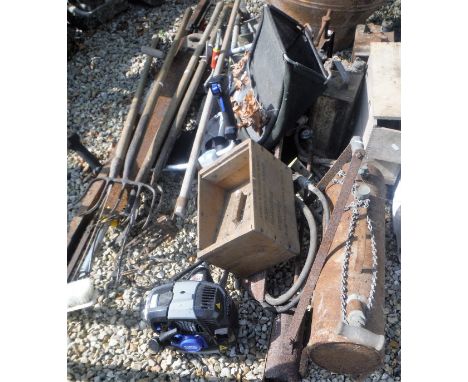 A pedal knife grinder and a vintage push lawn edger, together with various garden tools, pitchforks, etc, wooden boxes and a 