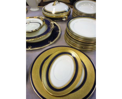 A collection of dinner and tea wares to include Aynsley "Georgian Cobalt 7348", Royal Worcester "Caesar" pattern and Spode "E