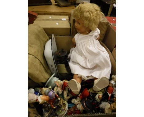 A quantity of assorted miscellaneous items to include dolls of the world, china, fishing reels, kit bags, film projector equi