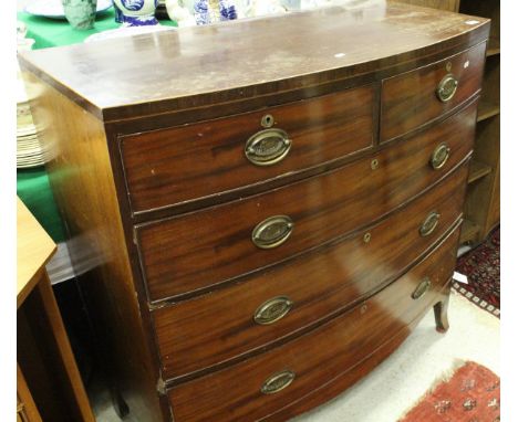 A 19th Century mahogany and inlaid bow front chest of drawers, the plain top above two short and three long drawers raised on