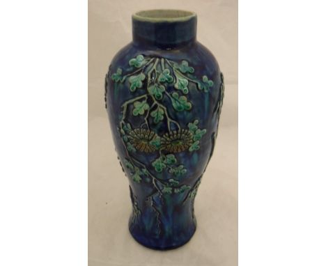 A Chinese porcelain vase with seal mark for Wang Bing Rong, circa 1900, decorated in relief with bamboo and flowers