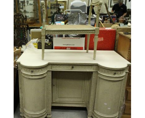 A modern painted oak breakfront dressing table, the plain top above three drawers and two cupboard doors flanking a central c