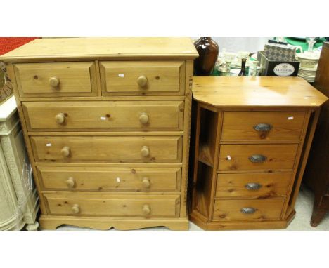 A modern pine chest of drawers, the plain top above two short and four long drawers raised on bracket feet, together with a f