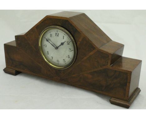 A walnut Art Deco mantle clock with Arabic numerals to the dial