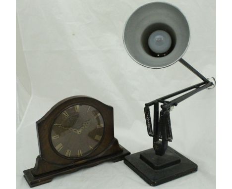 A black anglepoise lamp by Herbert Terry of Redditch, raised on a stepped base, together with a Smith's mantle clock with Rom