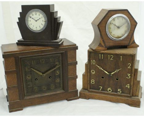 A 1930's mahogany and rosewood banded cased mantle clock, the Enfield movement with circular dial and Arabic numerals togethe