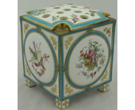 A Continental hand-painted Sèvres style bow pot, the body of cuboid form, the panels each decorated with musical instruments 