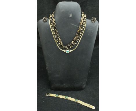 A 1920's brown glass Art Deco necklace and earrings, a collection of assorted hat pins to include turned metal topped and sim