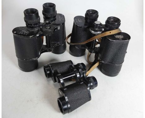 A pair of Karl Zeiss Jena 10x50 binoculars in fitted leather case, and two further pairs of binoculars