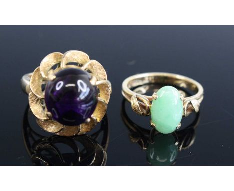 A modern 14ct gold cabochon amethyst set dress ring, size L; together with one other set with a cabochon jade, size L, gross 