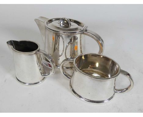 A 20th century Elkington plate three piece tea service to include teapot, sugar bowl, and cream jug, each of plain oval form
