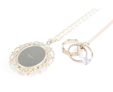 A modern 9ct gold oval picture locket, 32mm, on finelink neck chain, 55cm; together with a 9ct gold finelink neck chain with 