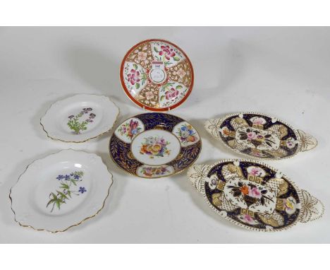 An early 19th century English porcelain cabinet plate, polychrome enamel decorated with floral sprays within cobalt gilt and 