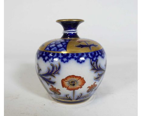 An early 20th century James Macintyre &amp; Co. Burslem vase of squat circular form, decorated in the Imari palette, on a whi