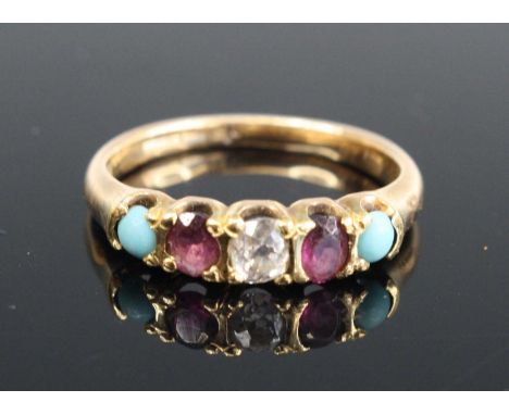 An early 20th century 9ct gold half-hoop ring, centre set with an oval cut diamond in turn flanked by garnets and turquoise, 