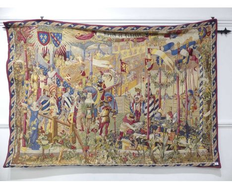 A large reproduction woolwork tapestry depicting a medieval jousting scene, h.125cm, w.180cmIn good condition.