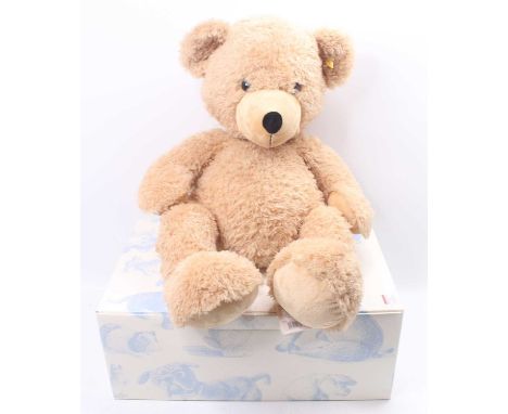 A Steiff solft-filled light beige/brown bear for kids named Fynn, 80cm example, with chest tag, yellow tag to ear, No. 111389