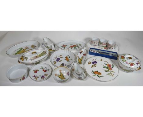 A collection of Royal Worcester Evesham pattern tablewares to include tureens, various dishes, sauceboat on stand, etc