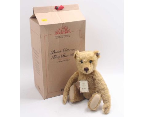 A Steiff British Collectors' Teddy Bear 2002, a replica 1908 example, comprising golden mohair with white tag, No. 660726, li