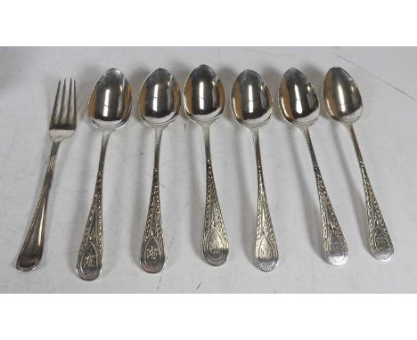A matched set of six George III silver teaspoons, each having bright cut engraved decoration and monogrammed stems; together 