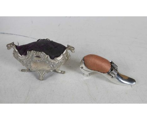 An Edwardian silver novelty pin cushion in the form of a shoe, maker Adie &amp; Lovekin Ltd, Birmingham, 1902, 6.5cm, togethe