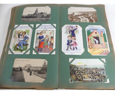 An Edwardian postcard album containing humerous, real photographic, street scenes, portrait and topographical examples togeth