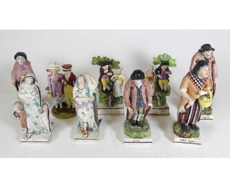 A 19th century Staffordshire pearlware figure of a gentleman dressed in a light brown coat and yellow breeches, resting on a 