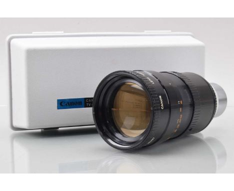 A Canon TV-16 25-100mm f/1.8 Lens, serial no 30397, barrel G-VG, elements G, some light dust, with focusing bar, manual, in c